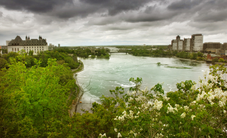 Image of the Supreme Court alongside the Ottawa River