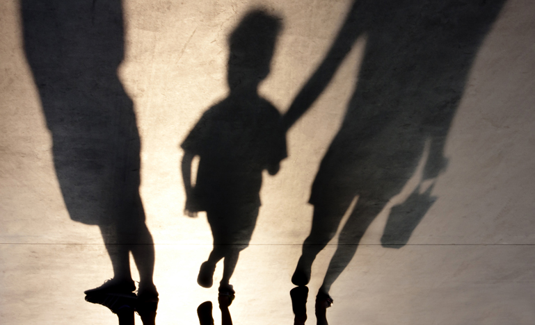 Shadow of parents and a child