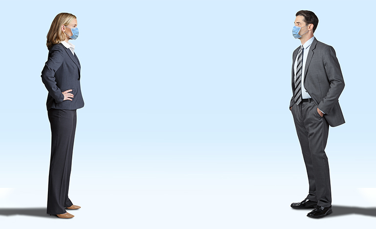 Man And Woman Wearing Protective Masks While Social Distancing