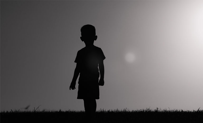 Silhouette child walking