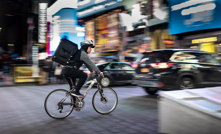 Delivery worker ona bicycle