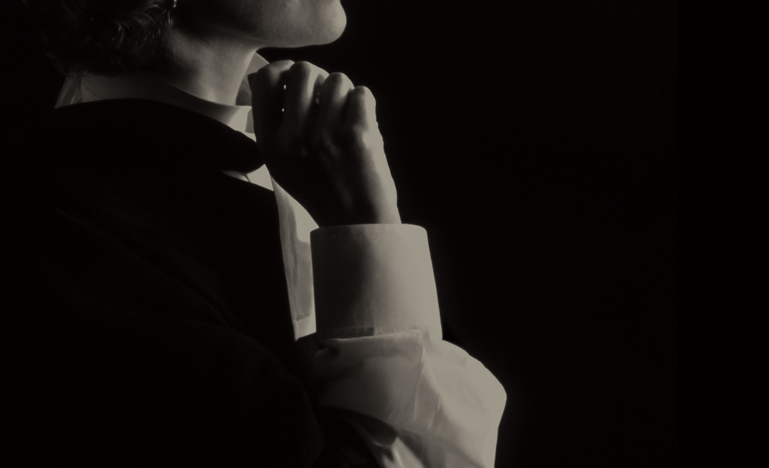 Person putting on their robe