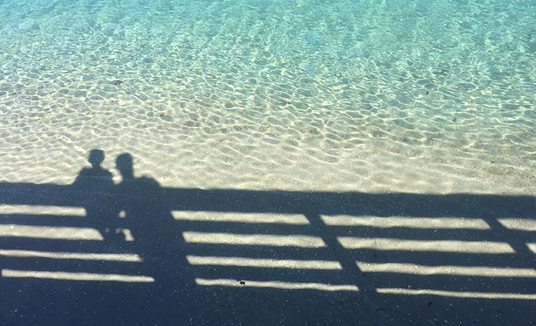 silhouette of two people