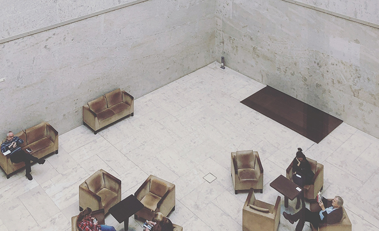 outdoor patio with people working on it