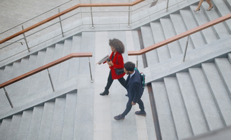 Top view of two professionals walking