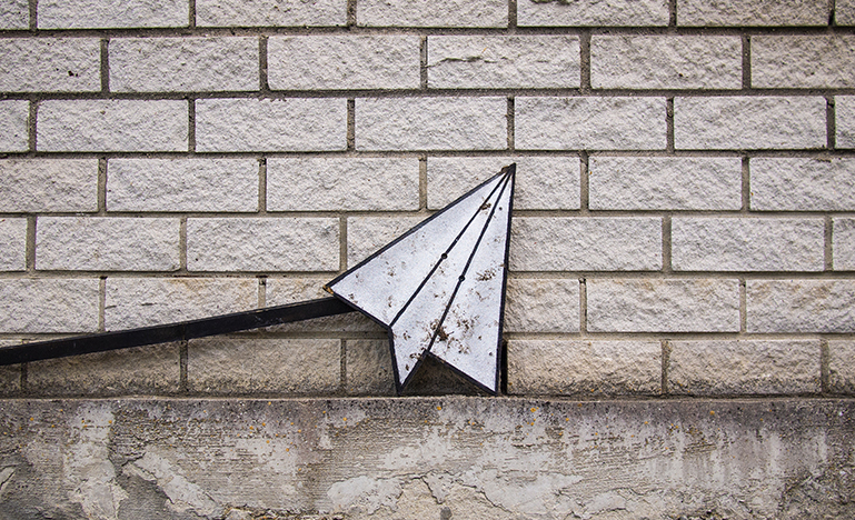 Street art depicting a paper airplane
